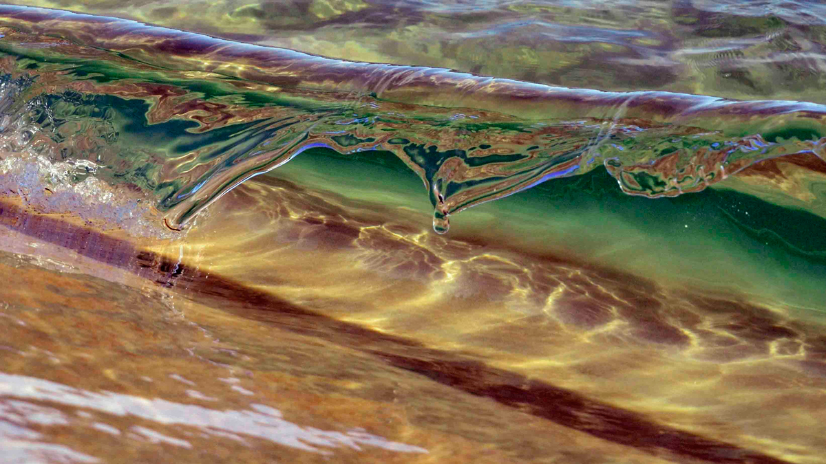 Looking through the heart of a four inch wave. Photo: <a href=\"https://debmwaveart.webs.com/\">Deb Morris</a>