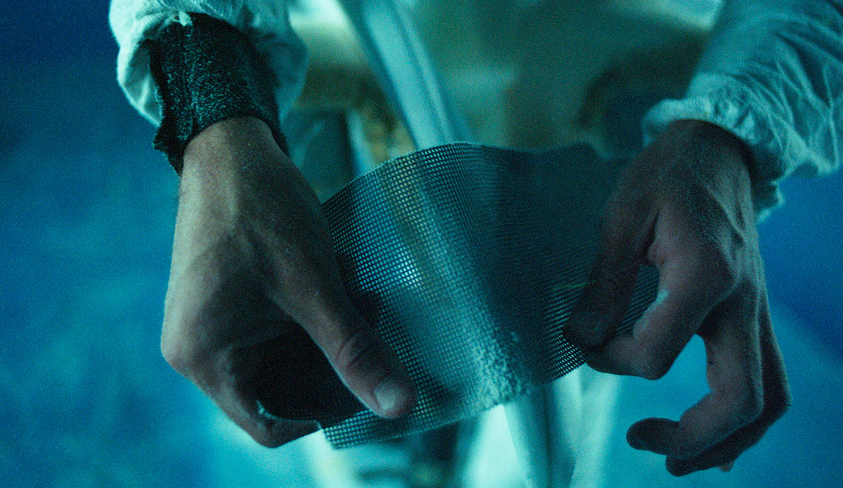 Adam Warden in the shaping bay photographed on medium format. I was here to video and piggy backed the shoot with some 120 film. Seeing these results just made me feel right, the details deserve to be slowed down. I throw film photos into the mix as much as I can. Photo: <a href=\"https://www.ryanstruck.com/\"> Ryan Struck</a>