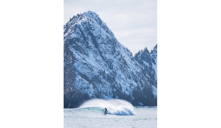 Photo: <a href=\"https://alaskasurfguides.com/heli-surfing\"> Alaska Surf Guides </a>