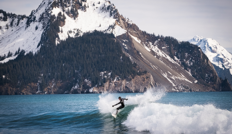 Photo: <a href=\"https://alaskasurfguides.com/heli-surfing\"> Alaska Surf Guides </a>