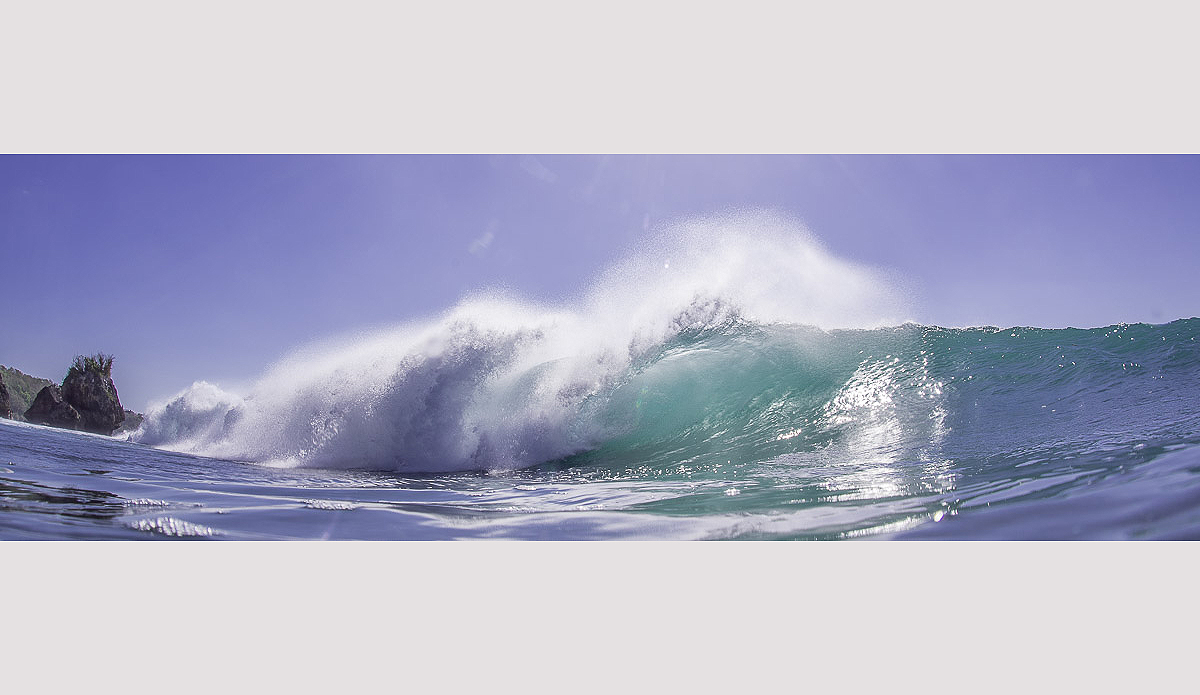 Padang is hollow, fast and damn shallow.  Make the section and you’ll be kicking out in the channel with a smile.  If you don’t make it, you just hope there’s not a another behind. Photo: Austin Robertson