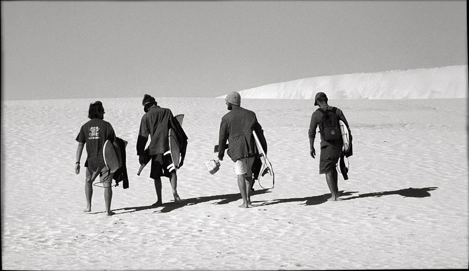 This is heading over to Turtles with some really good mates. It\'s one of those completely liberated times of our lives as surfers where even walking kilometres over sand dunes with nothing but boards under our arms and a bit of water felt like a completely normal experience. Photo: <a href=\"https://www.submerge.com.au\" target=_blank>Dean Dampney</a>.