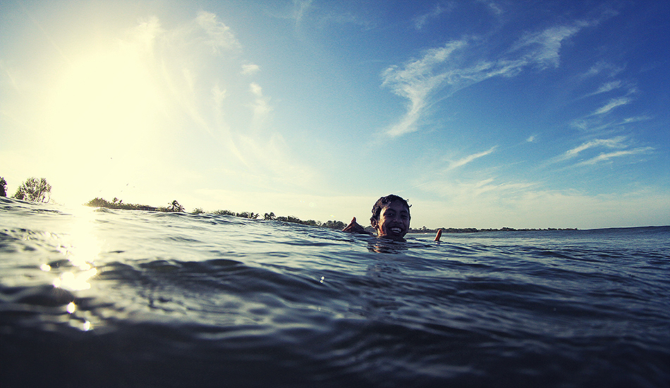 This is a local Nicaraguan boy named Jorge. Unfortunately, he was born deaf and cannot hear or speak, but he loves the water and is actually a pretty good surfer. He likes throwing up the shaka and has his own hand signs for cutbacks and tubes. Photo: Greg Heine