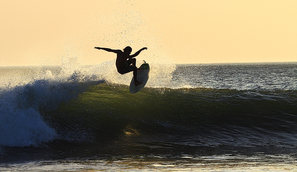 A few nights we surfed through the sunset until it was dark. Fun waves, just a few guys out. Photo: Greg Heine