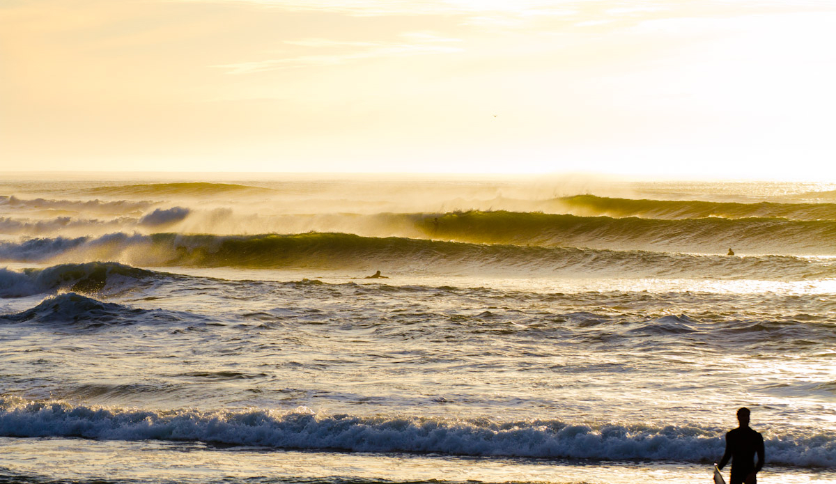Moving three hours up the west coast, we run into Elands Bay. The point needs a fairly large swell to wrap into the bay and start working properly, but when the elements align, the place cranks. This shot and the next one were taken mid-winter, but looks more like an Indo lineup. Photo: <a href=\"https://www.ijtphoto.weebly.com/\">Ian Thurtell</a>