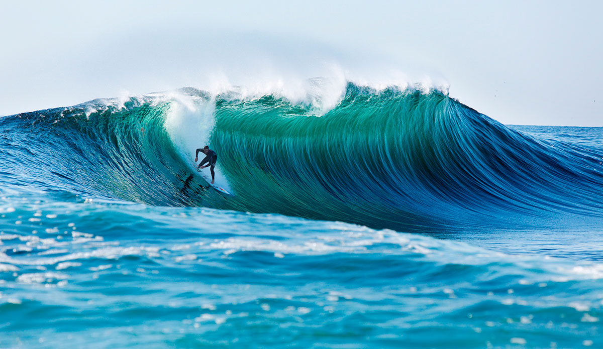 Ian Walsh slips into an Atlantic drainer. Photo: Red Bull/<a href=\"https://www.briannevins.com/\">Brian Nevins</a>