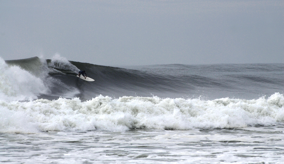 This is Long Island\'s own Tommy Bunger surfing Hurricane Bill swell at Gilgo in August 2009.  Photo: <a href=\"https://www.timelessride.com\">Jim Cook</a>