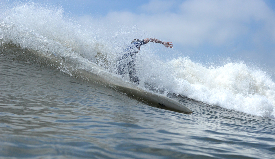 Unknown surfer putting it on a rail last fall. Photo: <a href=\"https://follyhood.blogspot.com\">Justin Morris</a>