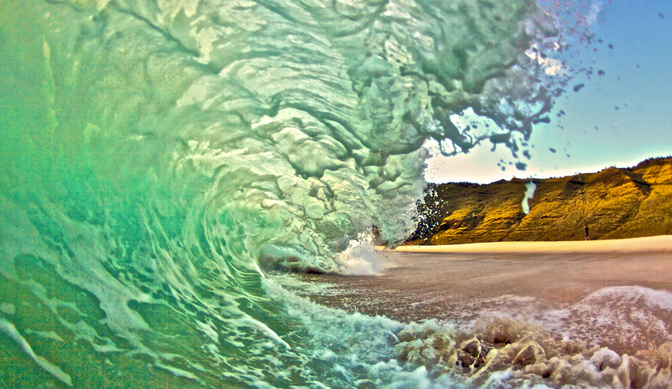 Yokohama green monster shorebreak. The next day I came back because the waves were epic, got so excited I didn\'t tighten my housing and leaked. Ruined my camera and lens, over $3,000 in damages not covered.  Image: <a href=\"https://gokenji.com/port/\" target=\"_blank\">Croman</a>