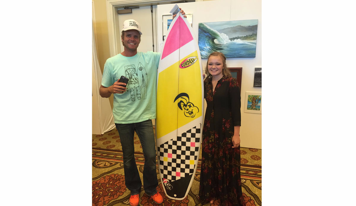 Newport Beach shaper Cordell Miller with the board he created for CF ambassador Shelby Klug. Photo: Cystic Fibrosis Foundation