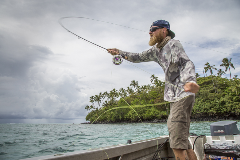 Fatu, a local with a small boat, tells us in no uncertain terms he knew where the fish were. Ignoring a looming storm front, we head out in search of blue water fish, then move inshore to the reef in hopes of GTs.