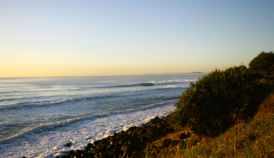 DAWNING LIGHT - BURLEIGH HEADS.
Further south along the headland at Burleigh are lovely long peaks when the swell is really big. It\'s a soulful place to be at sunrise and puts you right in the present. Photo: <a href=\"https://www.bluespherephotography.com\">Shelli Bankier</a>