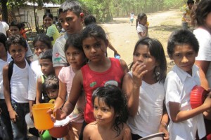 In the Nicaraguan version of "the Projects," the children lined up for hours to get clothing and food. Photo: Infamous Management