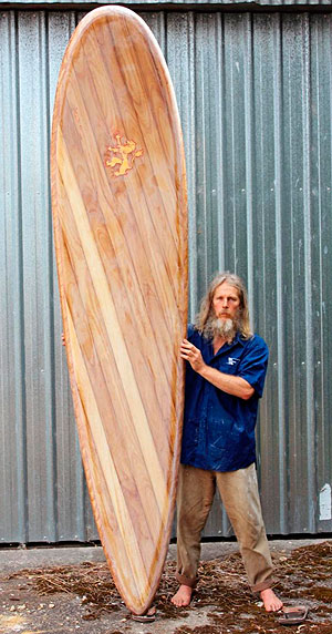 At least he's using a shitty old flip flop to stand more than a million dollars worth of surfboard on.