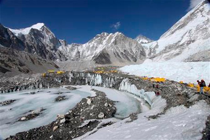 According to Ang Tshering of the Nepal Mountaineering Association, an avalanche triggered by a massive earthquake in Nepal smashed into a base camp between the Khumbu Icefall (pictured above this past April 11, 2015), a notoriously treacherous rugged area of collapsed ice and snow, and the base camp where most climbing expeditions are. Photo: Tashi Sherpa via AP