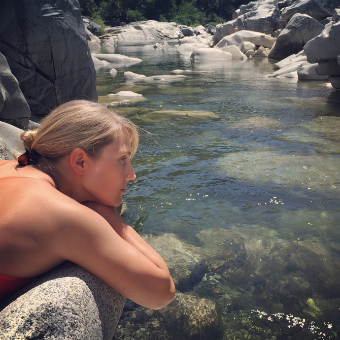 ASC athlete Jessica Kilroy enjoys a quiet moment after collecting water samples from the Yuba River in California. Photo: Sequoia Haughey