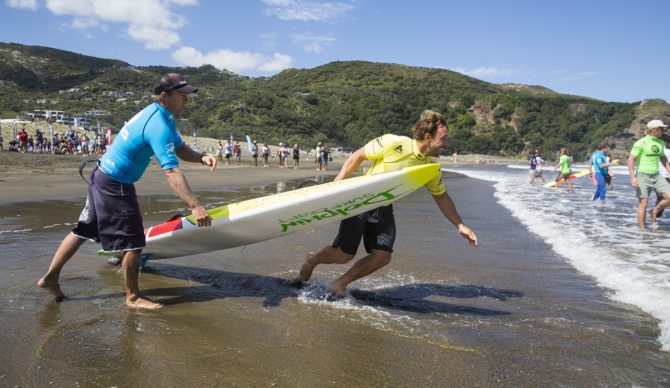 Big wave surfer Mark Visser competes in a prone paddle race on New Zealand's North Island. Photo: Mike Smolowe