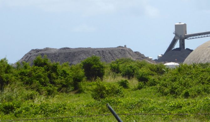 A five-story coal ash pile next to the AES electric power plant in Guayama, Puerto Rico. Photo: Lloréns