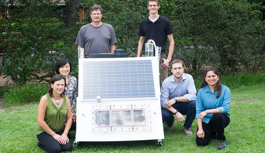 Rice University researchers (from left) Naomi Halas, Qilin Li, Peter Nordlander, Seth Pederson, Alessandro Alabastri and Pratiksha Dongare with a scaled up test bed of the NEWT Center’s direct solar desalination system. (Photo by Jeff Fitlow/Rice University)