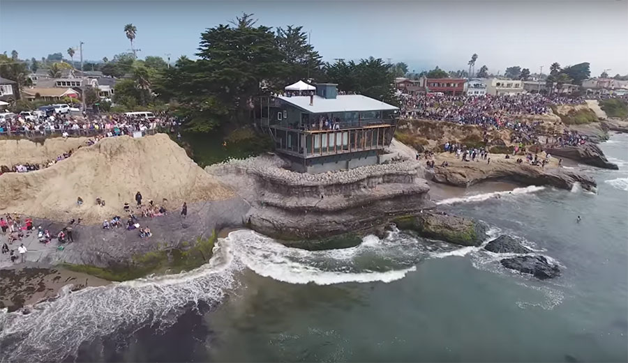 The crowd that showed up to watch the paddle out is estimated to be around 5,000 people.