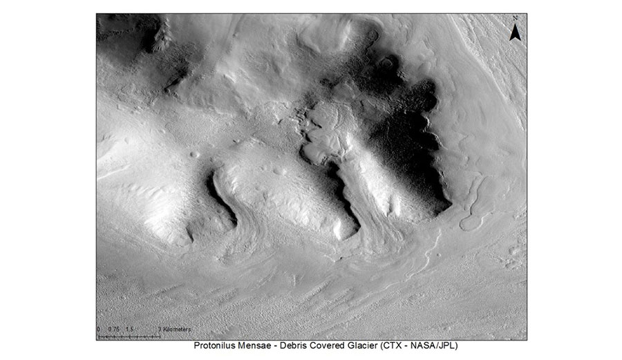 Image of a buried ice deposit in the Protonilus Mensae region on Mars. These features are considered analogous to debris-covered glaciers on Earth.