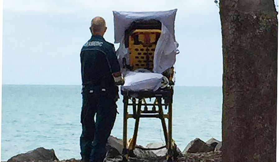 Two paramedics fulfilled a dying woman's wish to see the ocean one last time. 