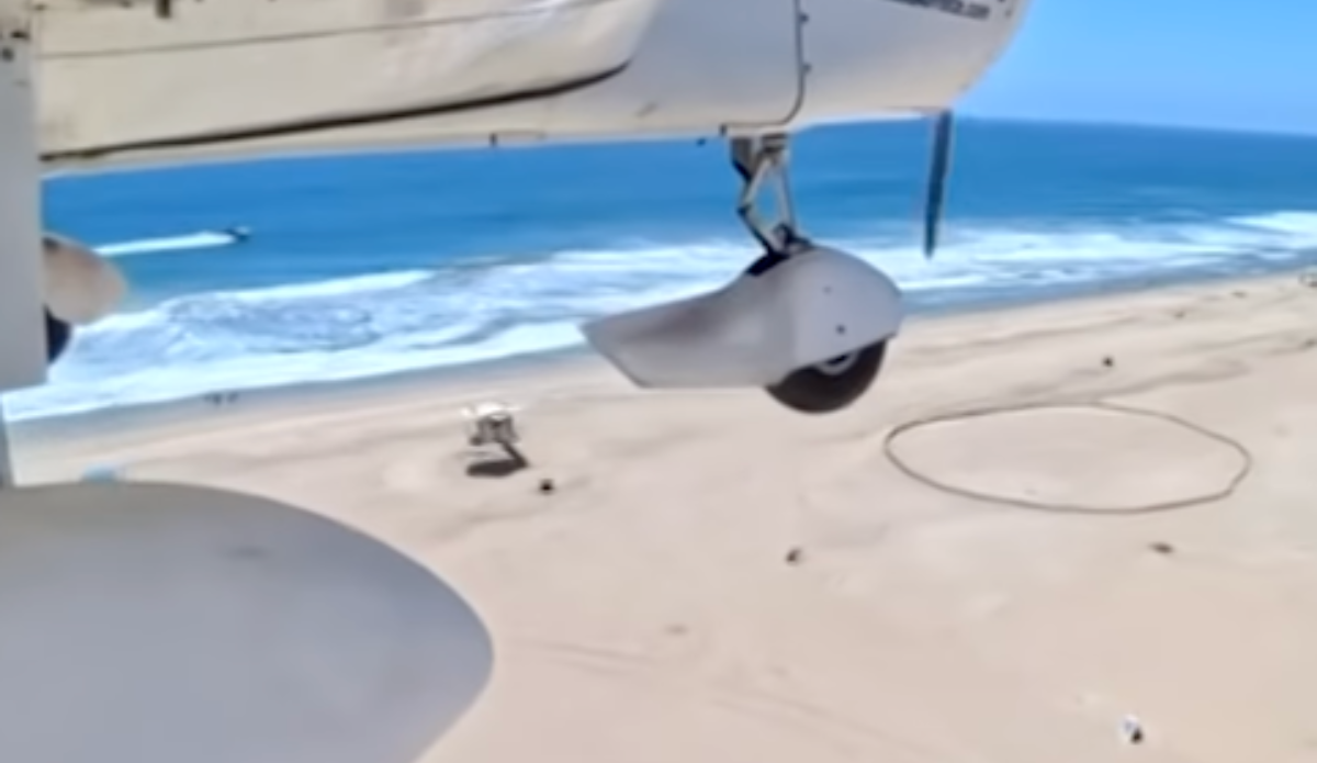 Small Airplane Makes Emergency Landing On the Sand In Huntington Beach