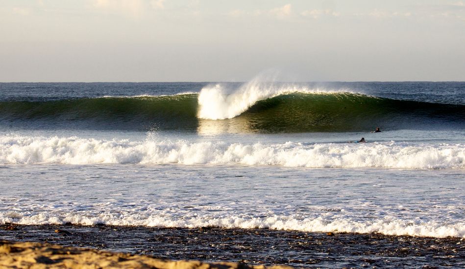 A golden morning at Lower Trestles. The large swell had the crowd spread wide and thin. The smaller waves that snuck through the crowd rewarded anyone waiting on the inside. Photo: <a href=\"https://www.quinnmatthews.com/\" target=_blank>Quinn Matthews</a>.