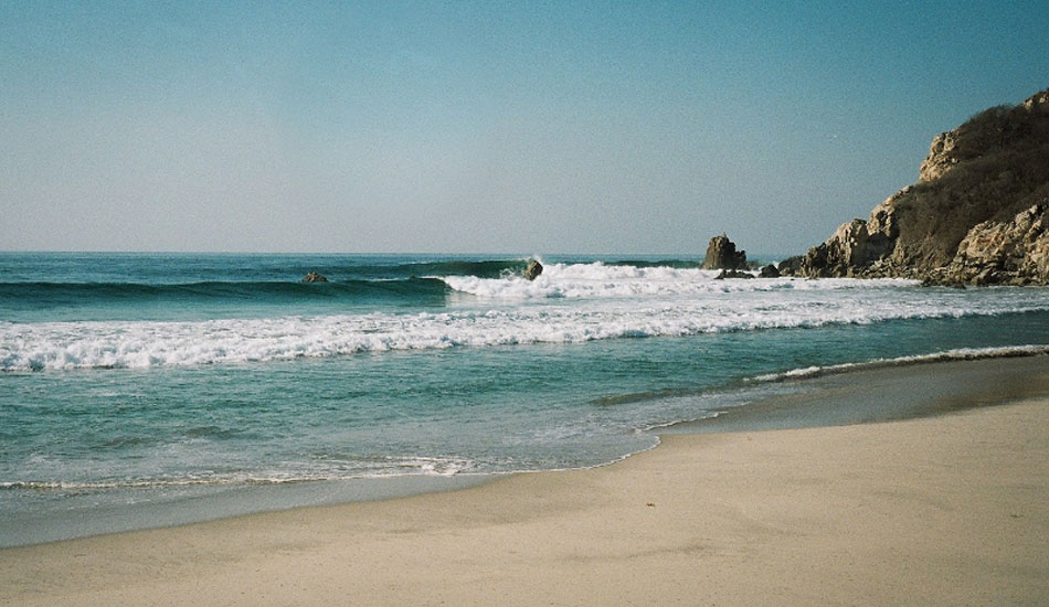 After two hours of getting lost and driving through soft sand, we found this spot but got stuck right as we pulled up. We managed to use the shell of a dead turtle for traction to get out of what would have been a really bad situation, and got some fun waves while dodging that rock you see in the middle.  Photo: <a href=\"https://mattdegreff.com/\" target=_blank>Matt Degreff</a>.