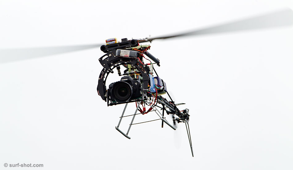 The surf photo chopper making a stealth mission.  Photo: <a href=\"https://surf-shot.com\" target=\"_blank\">Surf-Shot.com</a>/Schmid