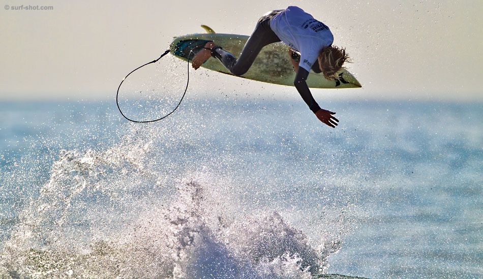 Competitors who snag a couple of solid scores in the beginning of their heat tend to cut loose in the final minutes. Colton Overin uses the racetrack that lines up from the rivermouth to launch into the next heat. Photo: <a href=\"https://www.surf-shot.com\" target=_blank>Surf-Shot.com</a>