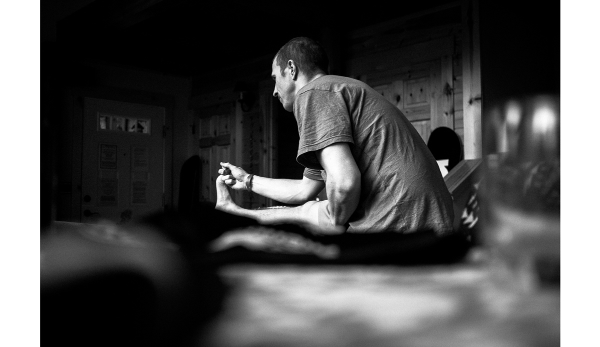 Terje stretching out before heading up to the Mt Baker Legendary Banked Slalom. These calm moments before contests or shoots are sometimes my favorite images from the whole time. Photo: <a href=\"https://www.adammoran.com/\">Adam Moran</a>