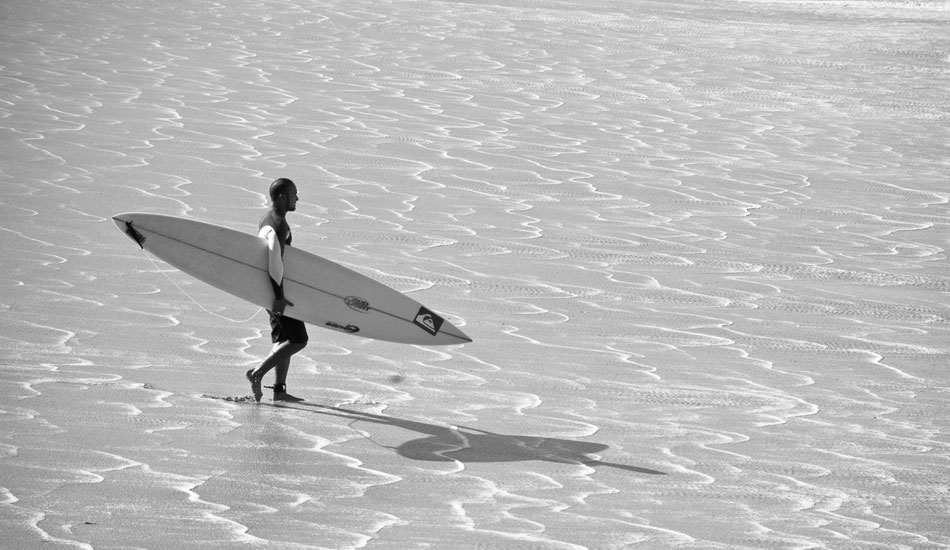 Those will not be small waves he\'s surfing. Photo: <a href=\"https://www.adamwarmington.com/\">Adam Warmington.</a>