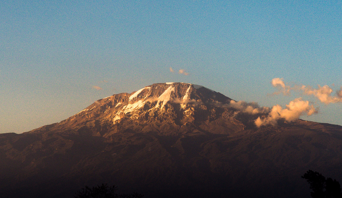 Kilimanjaro from the hotel\'s balcony. Photo: <a href=\"https://charlesaudet.com/\">Charles Audet</a>