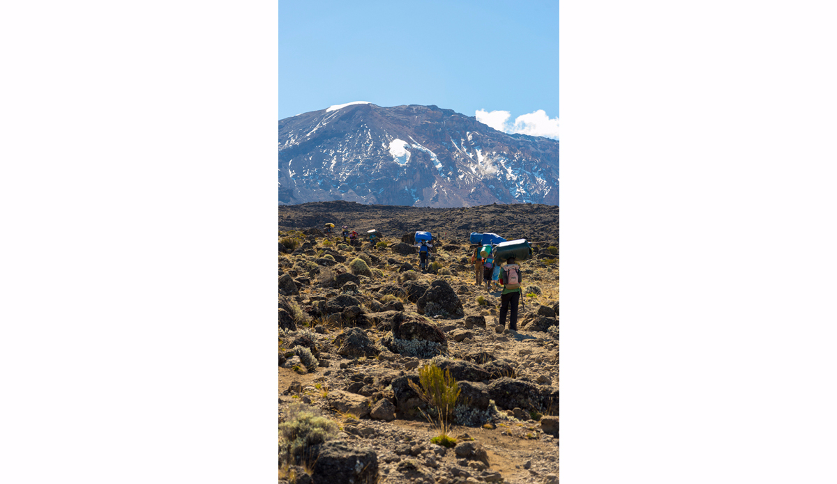 Porters. Photo: <a href=\"https://charlesaudet.com/\">Charles Audet</a>