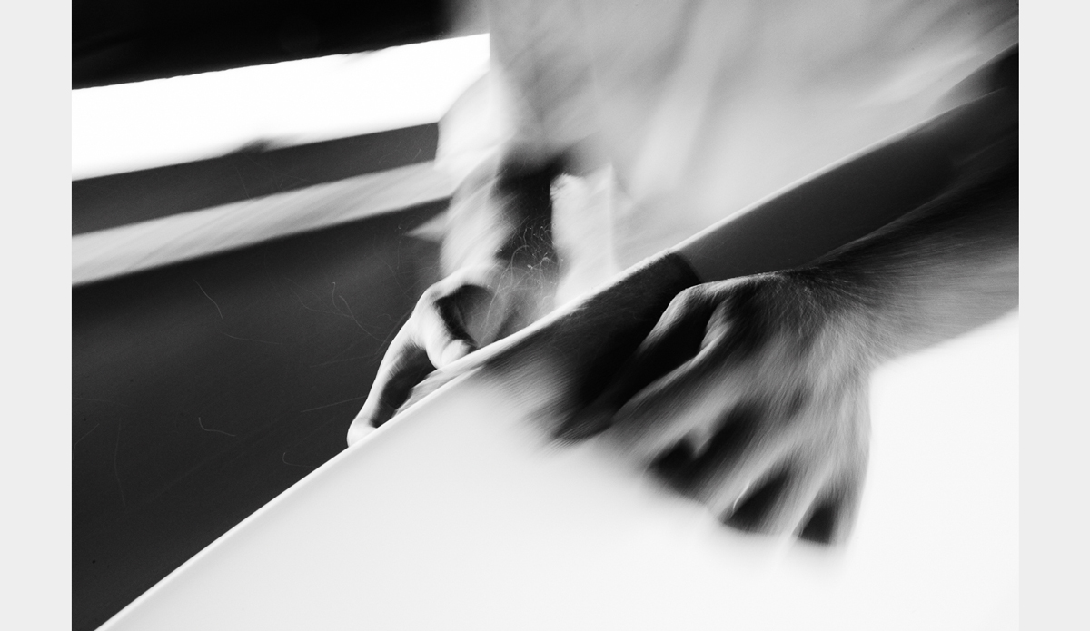 Boardshaping is such a fast paced process, and trying to freeze that motion completely does it a disservice. The little pieces of dust look a lot like sparks off the sander.  Photo: <a href=\"https://www.facebook.com/chrisdelorenzophotography\">Chris DeLorenzo</a>