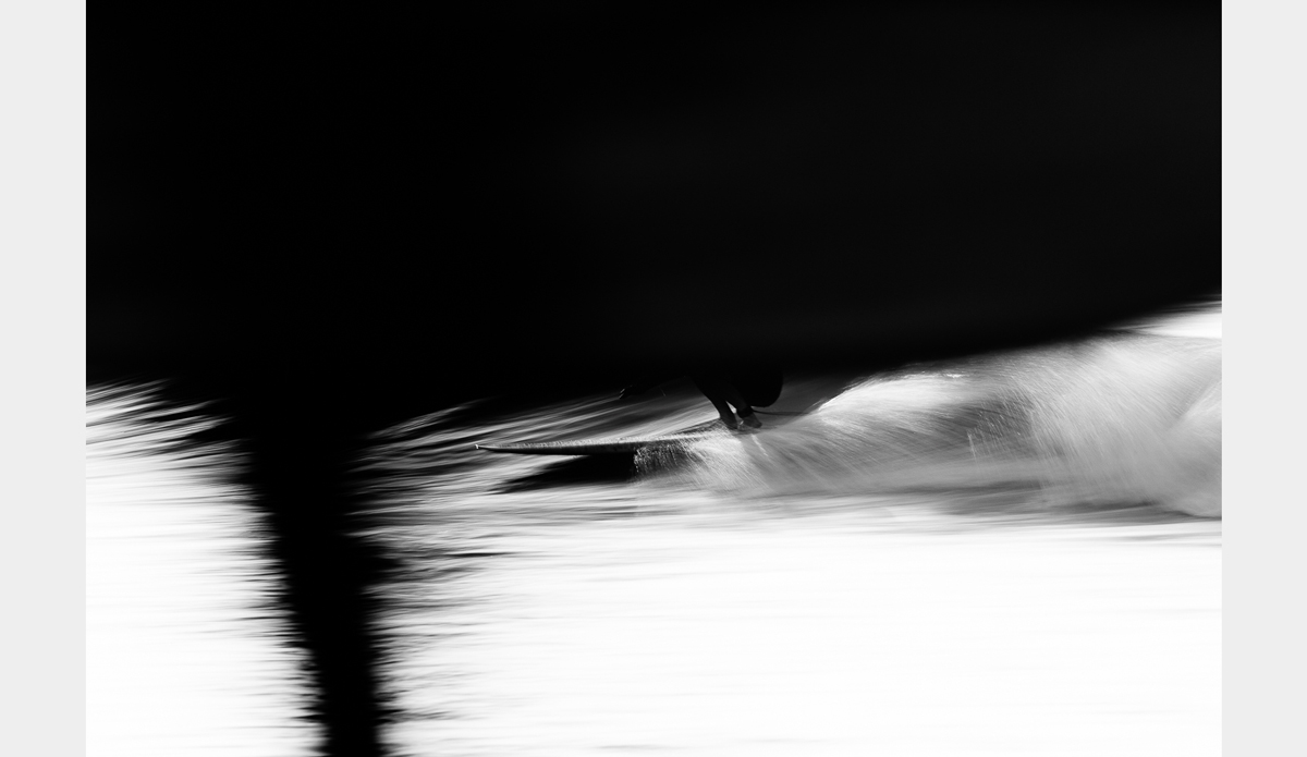 Another instance where a board blocked the top half of the image. Your eyes really focus on the feet and spray. Photo: <a href=\"https://www.facebook.com/chrisdelorenzophotography\">Chris DeLorenzo</a>