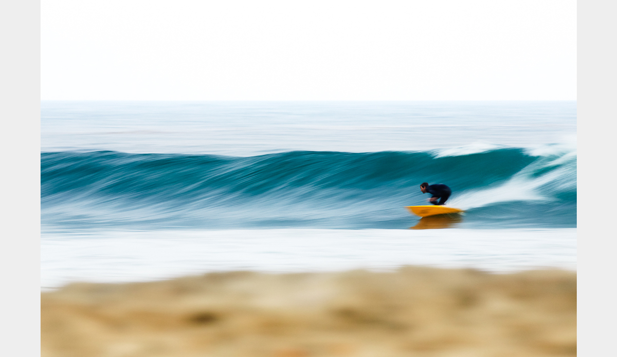 Nailing sharpness on with shortboard is nearly impossible. Most photographers use a faster shutter, but I prefer to keep it slow and take my chances. This is Chad Wensel and his head stayed sharp enough for the photo to work out. Photo: <a href=\"https://www.facebook.com/chrisdelorenzophotography\">Chris DeLorenzo</a>