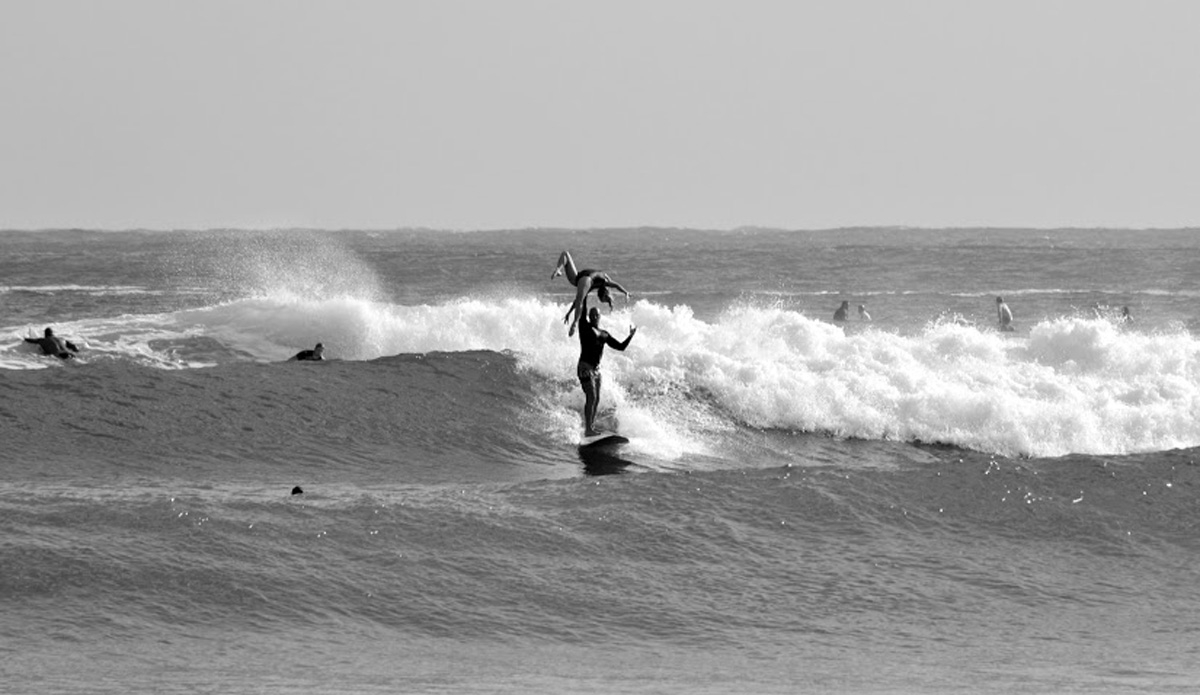 Two tandem surfers refine their skills before the iconic Noosa Surf Festival. Photo: <a href=\"https://instagram.com/alexbenaud\">Alex Benaud