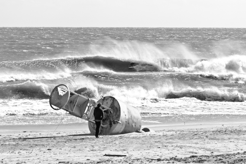 S Turns. OBX, NC 2011. Charlie Weatherby tucked into a drainer. Since Hurricane Sandy, this spot no longer exists. Photo: <a href=\"https://www.chrisfrickphotography.com/\" target=_blank>Chris Frick</a>