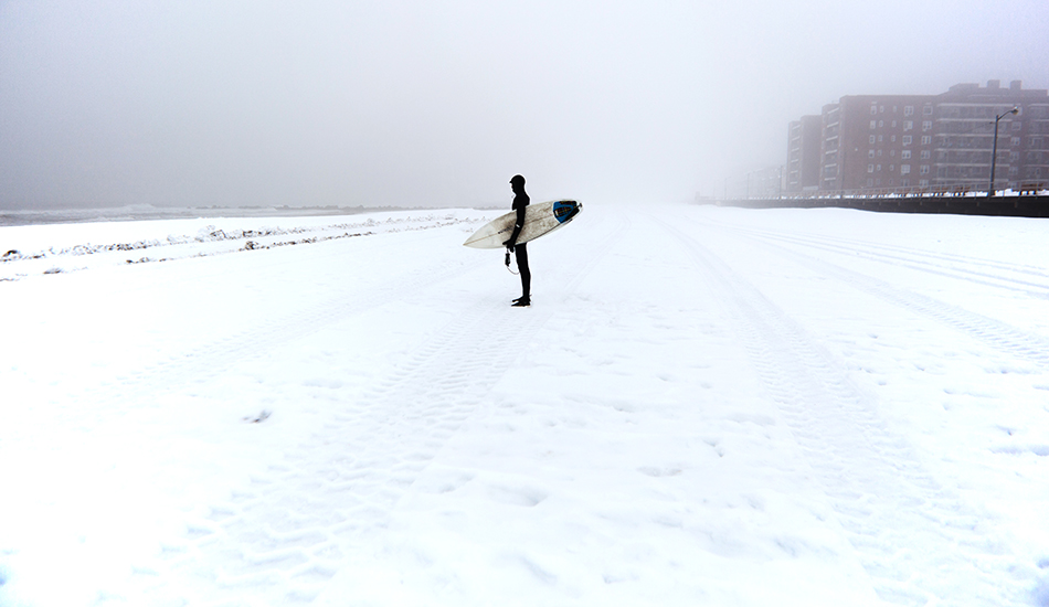 Joe Parrino in New York. This is a somewhat typical scene during our New York winters. It gets pretty freezy up here. There\\\'s an incredible silence that you can almost capture through a photograph of any snow scene. It looks as serene as it is. When it snows, it\\\'s such a wonderful silence, all those noises get blotted out and it\\\'s just you and your mind to think. Imagine that and looking at perfect surf. A nice solitude. Photo: <a href=\"https://clarkography.com/\" target=_blank>Matt Clark.</a>