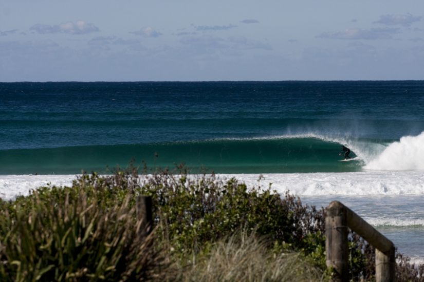 NSW. Local, Mick Moltzen pulling in. This beachbreak, near my home in Northern NSW, lights up under certain conditions to provide spectacularly luminous tubes. I love the refracted light at the base of the wave, a combination of time of day, whitish sand, clear water and west wind. Photo: <a href=\"https://www.sparkesphoto.com/\" target=_blank>David Sparkes</a>