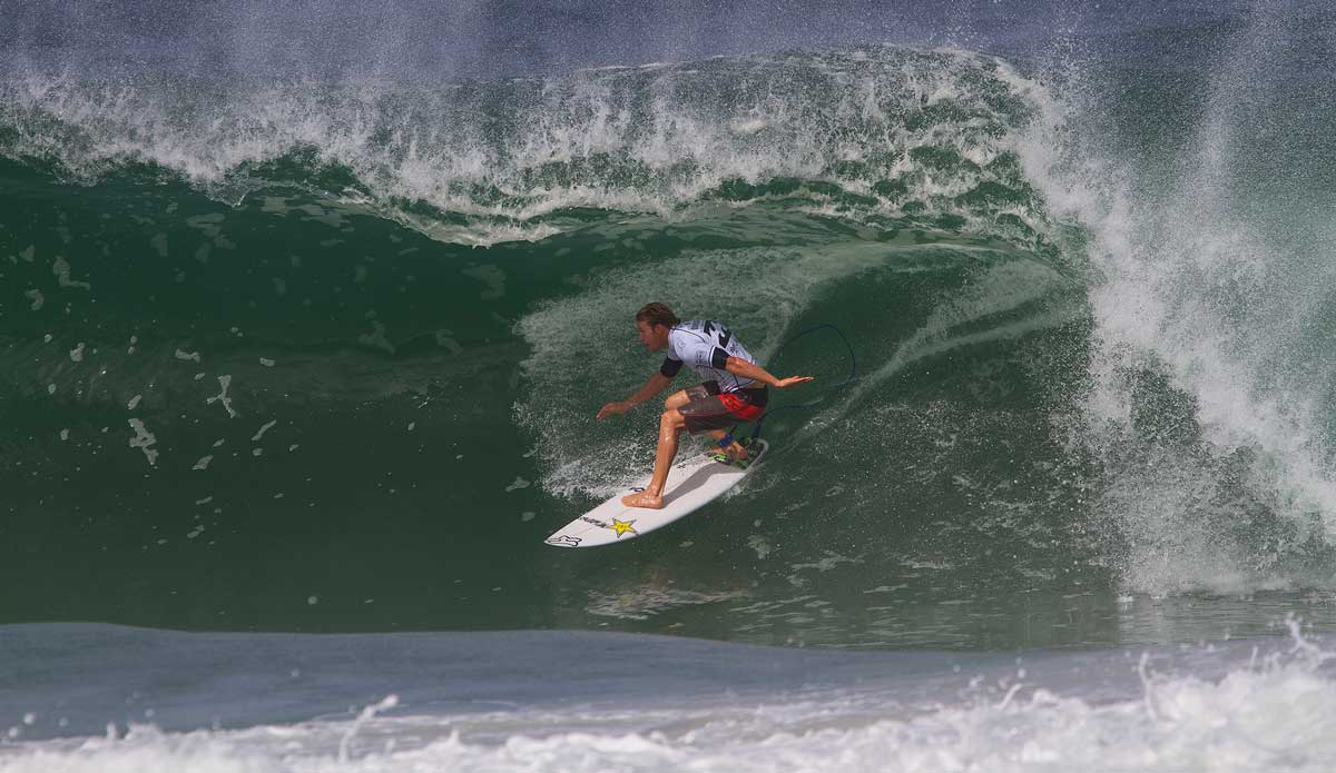 Bede Durbidge of Currumbin, Australia, reveled in the powerful beachbreak conditions, winning two rounds of competition to advance into the Quarterfinals. Durbidge posted a near-perfect 9.10 for a deep backhand barrel and cemented his win over Kolohe Andino (USA) and Kelly Slater (USA) with a solid 6.10 score. Photo: <a href=\"https://www.aspworldtour.com/\">ASP | Smorigo</a>