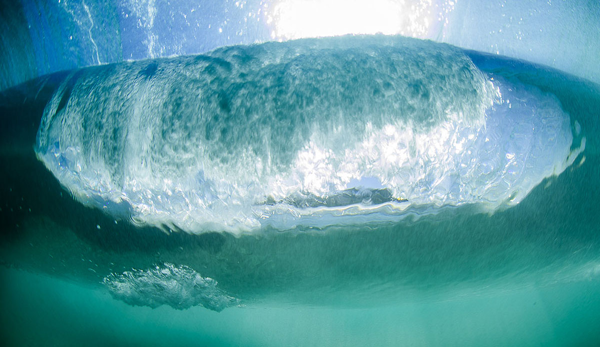 For me, photos of waves from beneath the surface are the most beautiful and thought provoking.  The water at this spot usually isn’t very clear but there were a few days this summer that shaped up nicely.  As long as I’m shooting surf photography, I’ll be chasing these shots. Photo: Austin Robertson