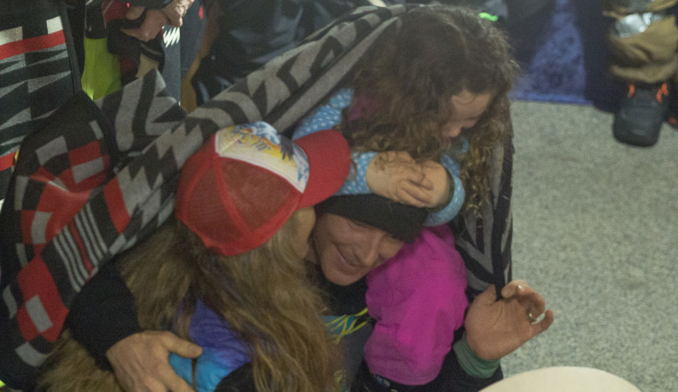 Gwyn Howat congratulates Temple Cummins (and his daugter) on getting the bronze duct tape for the Pro Men.