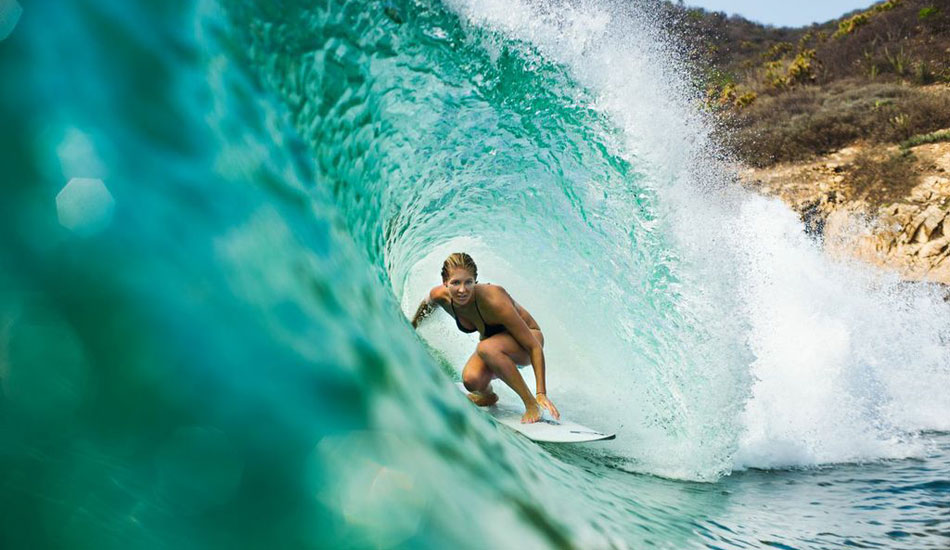 Stephanie Gilmore on a blue-green drainer. Photo: Quiksilver