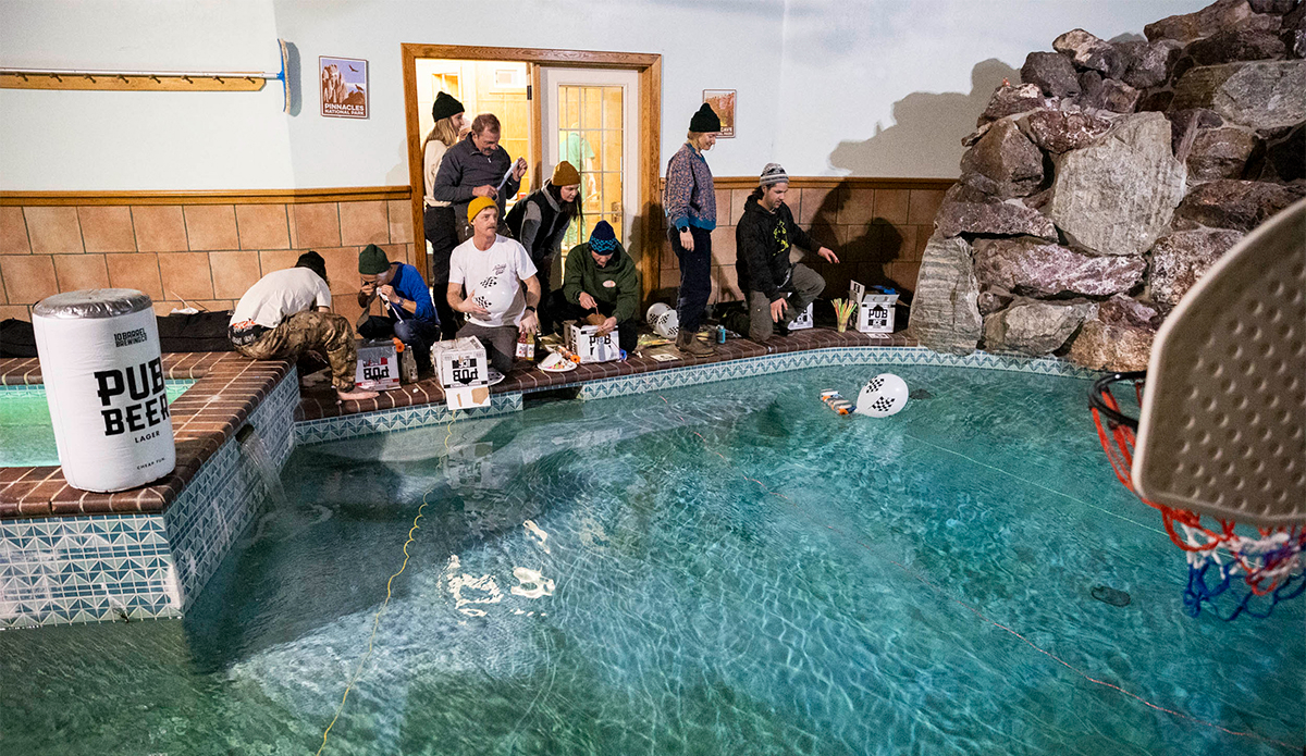 The pool, and hot tub, being utilized for beer games. 
