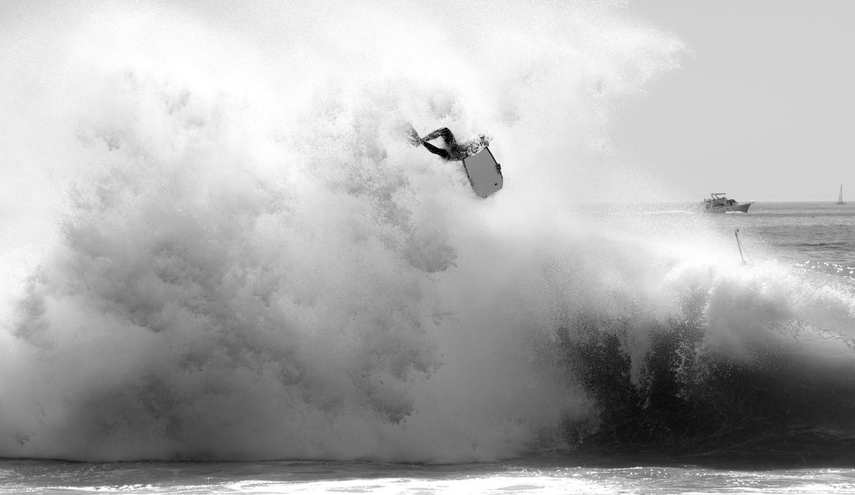 An unknown bodyboarder gets tossed in a backwash explosion. These guys take the hardest, most regular beatings of anyone out there. Photo: <a href=\"https://www.driftwoodfoto.com/\">Benjamin Ginsberg</a>