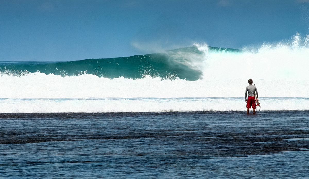 An empty one rolls through and spits while a surfer waits to time his paddle out.  Jimmy\'s right, Sumatra. Indonesia