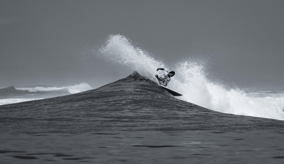 Grant powering through the end section at an outer reef pass.  Upola, Samoa.